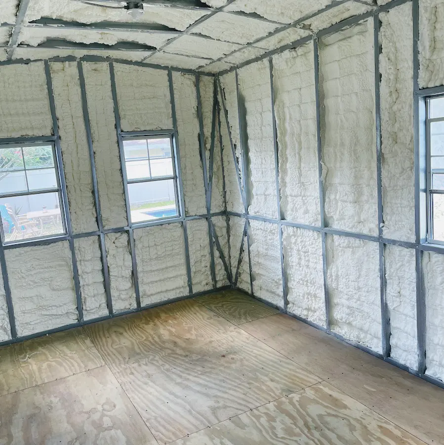 Closed-cell spray foam insulation applied to wall cavities in a residential project in Bel Air South